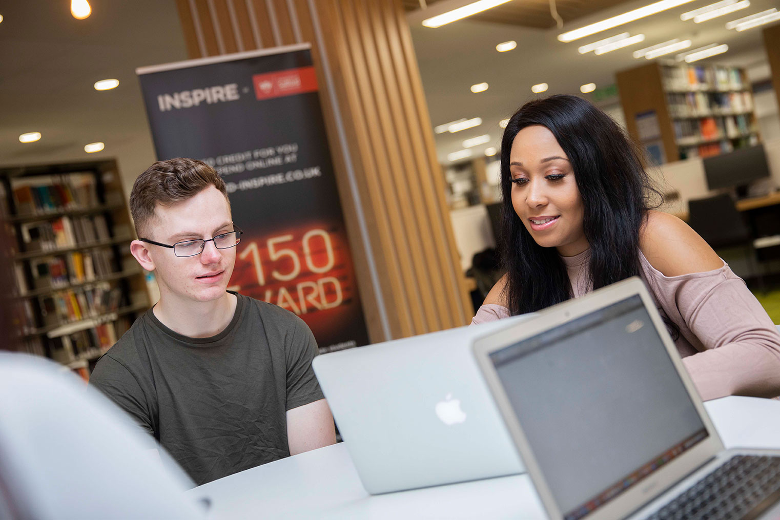 Students using a laptop