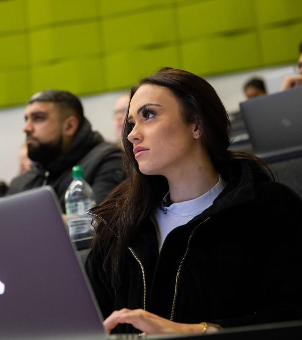 Students concentrating at a lecture