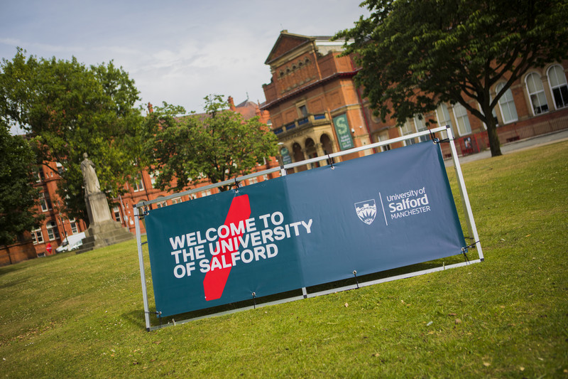 Welcome to the University of Salford signage on campus