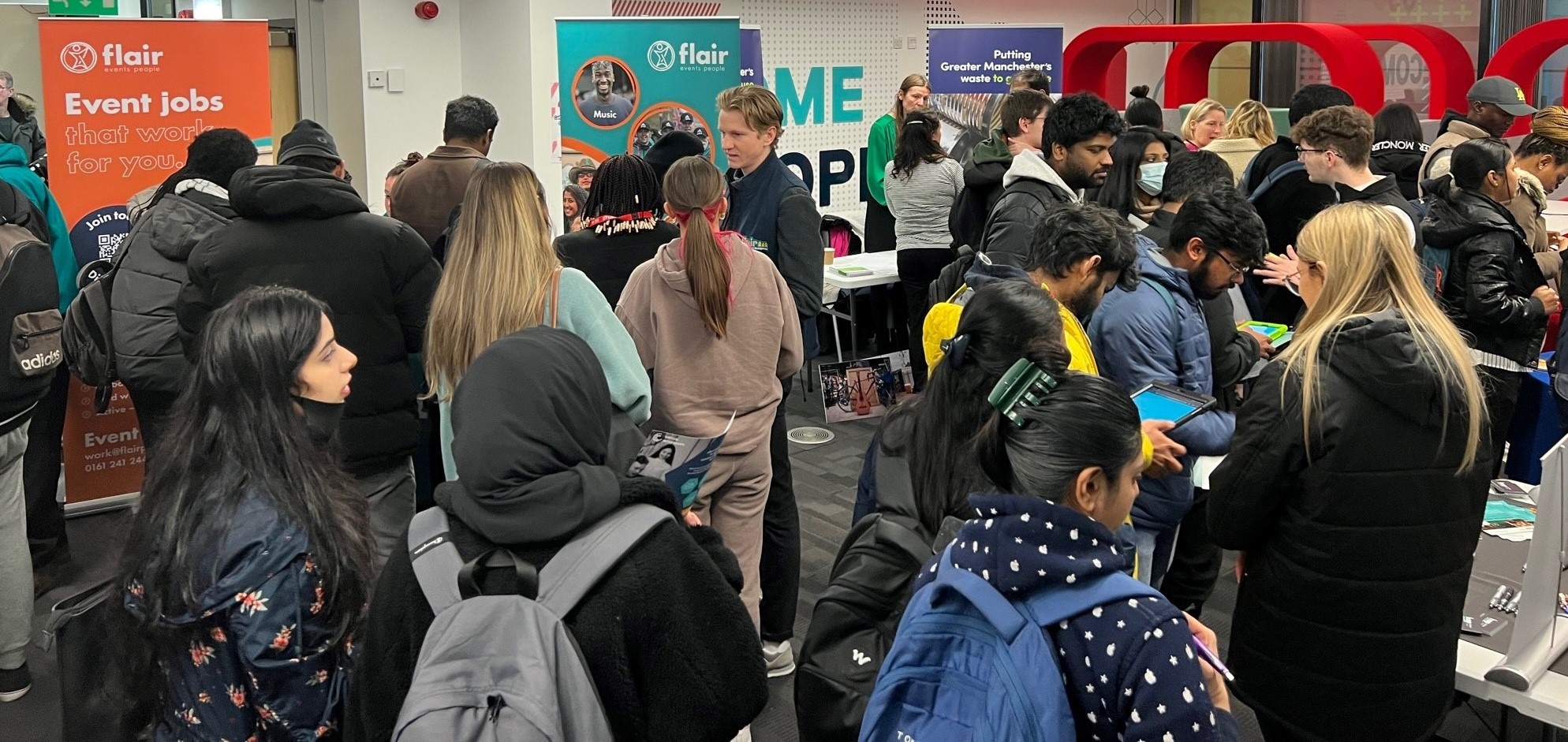 Image shows students at a careers fair 