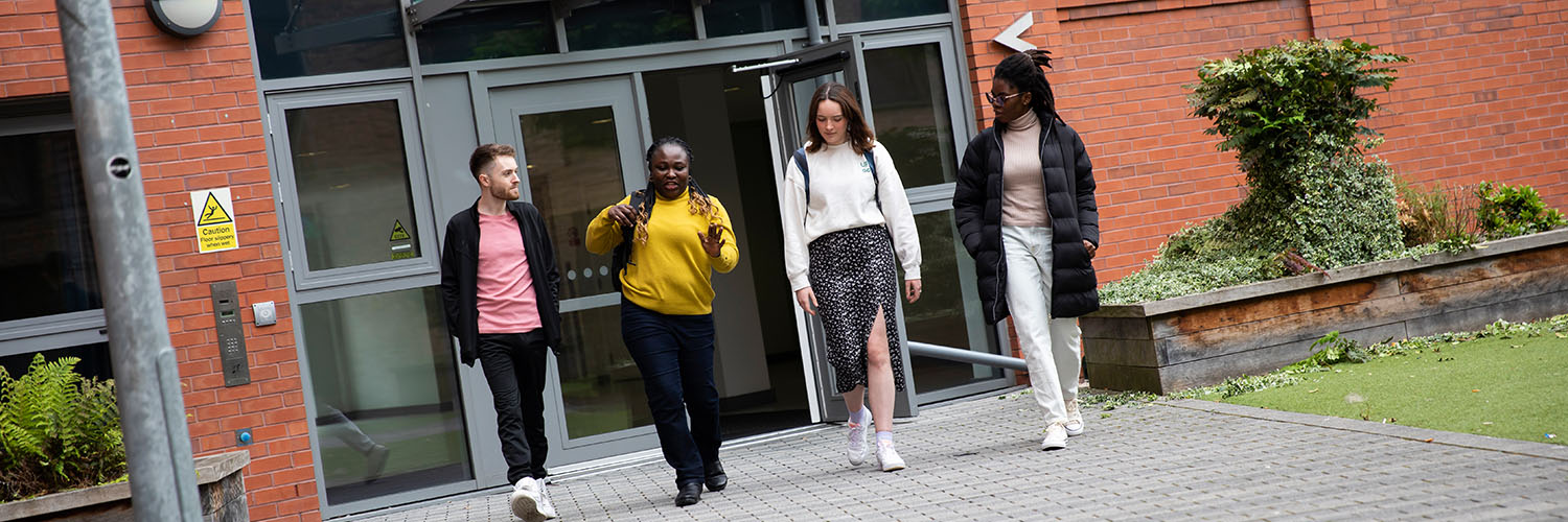 Students leaving Peel Park Quarter Accommodation after a viewing