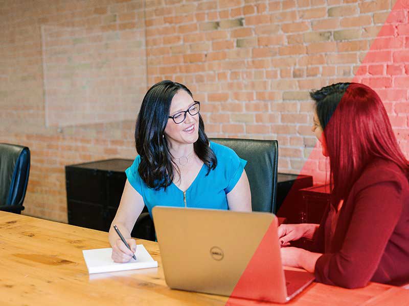 A careers adviser and a student talking