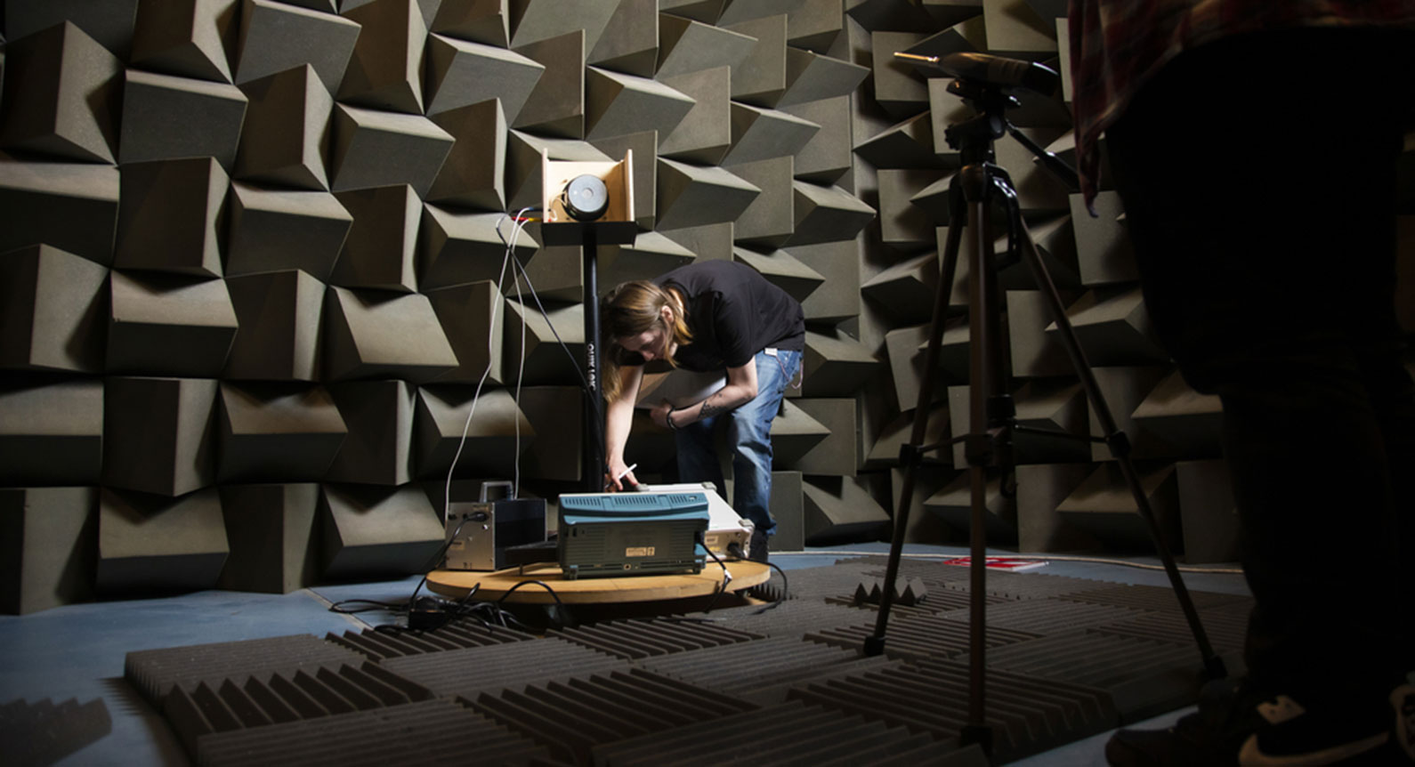 A researcher in the acoustics laboratory