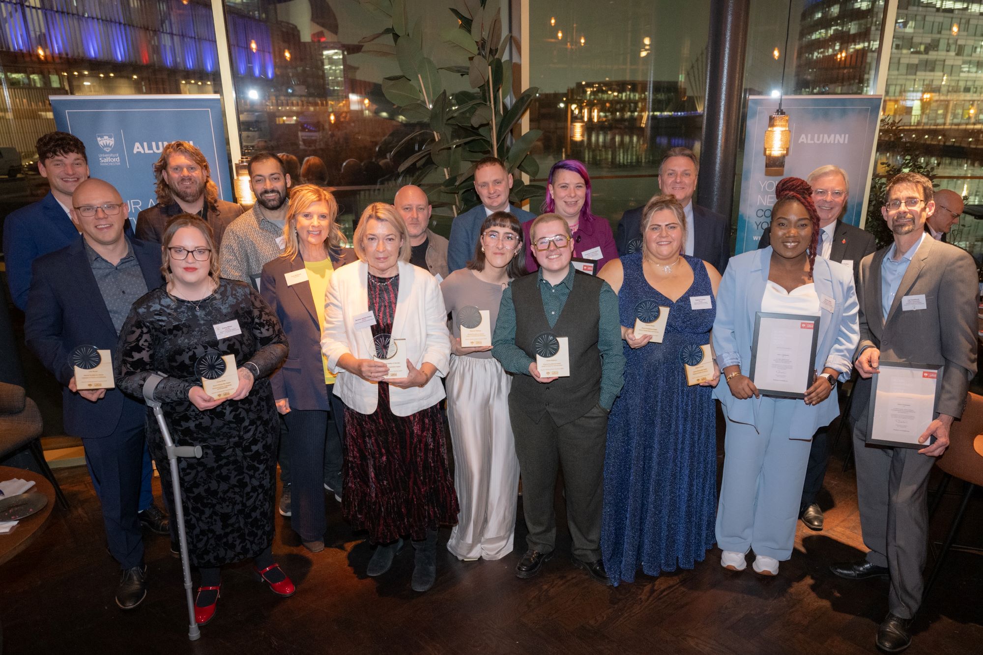 17 winners at the Alumni Achievement Awards 2024 in the Alchemist Bar, Mediacity