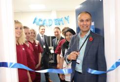Raj Jain, chief executive at the NCA cuts the ribbon for the Radiography Academy opening