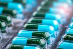 Green and blue medicinal capsules