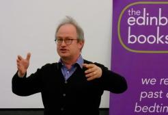 Robin Ince presenting a lecture