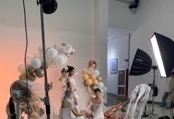 An image of models on a fashion set