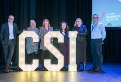 CSI team with lettering in lights