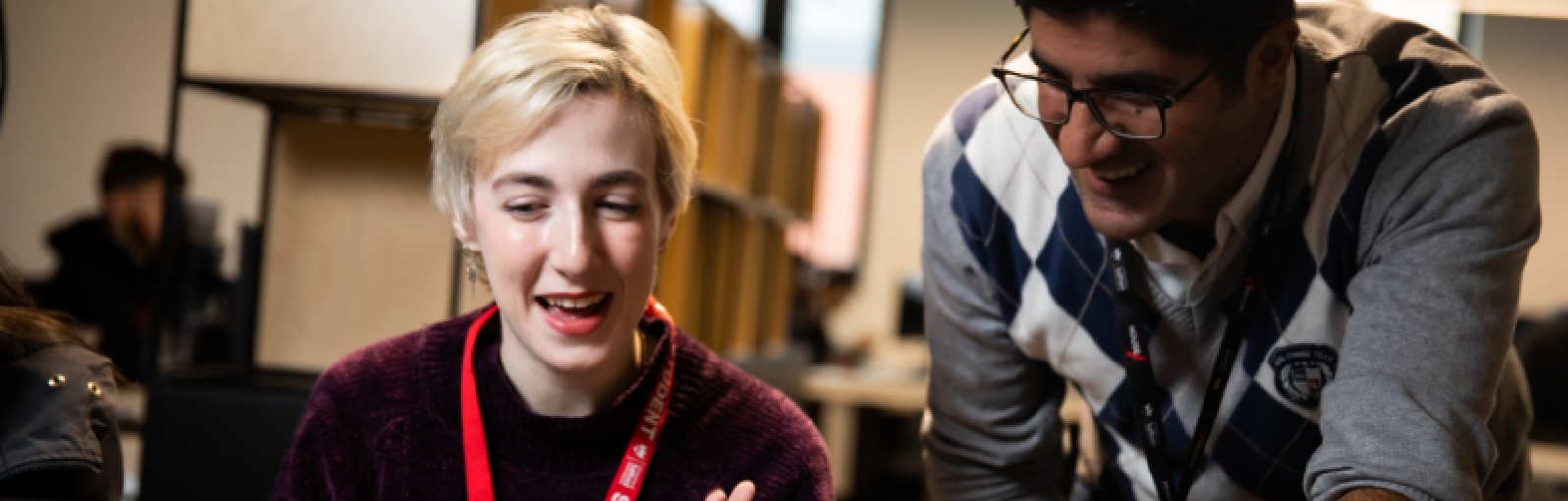 Female student talking to a tutor